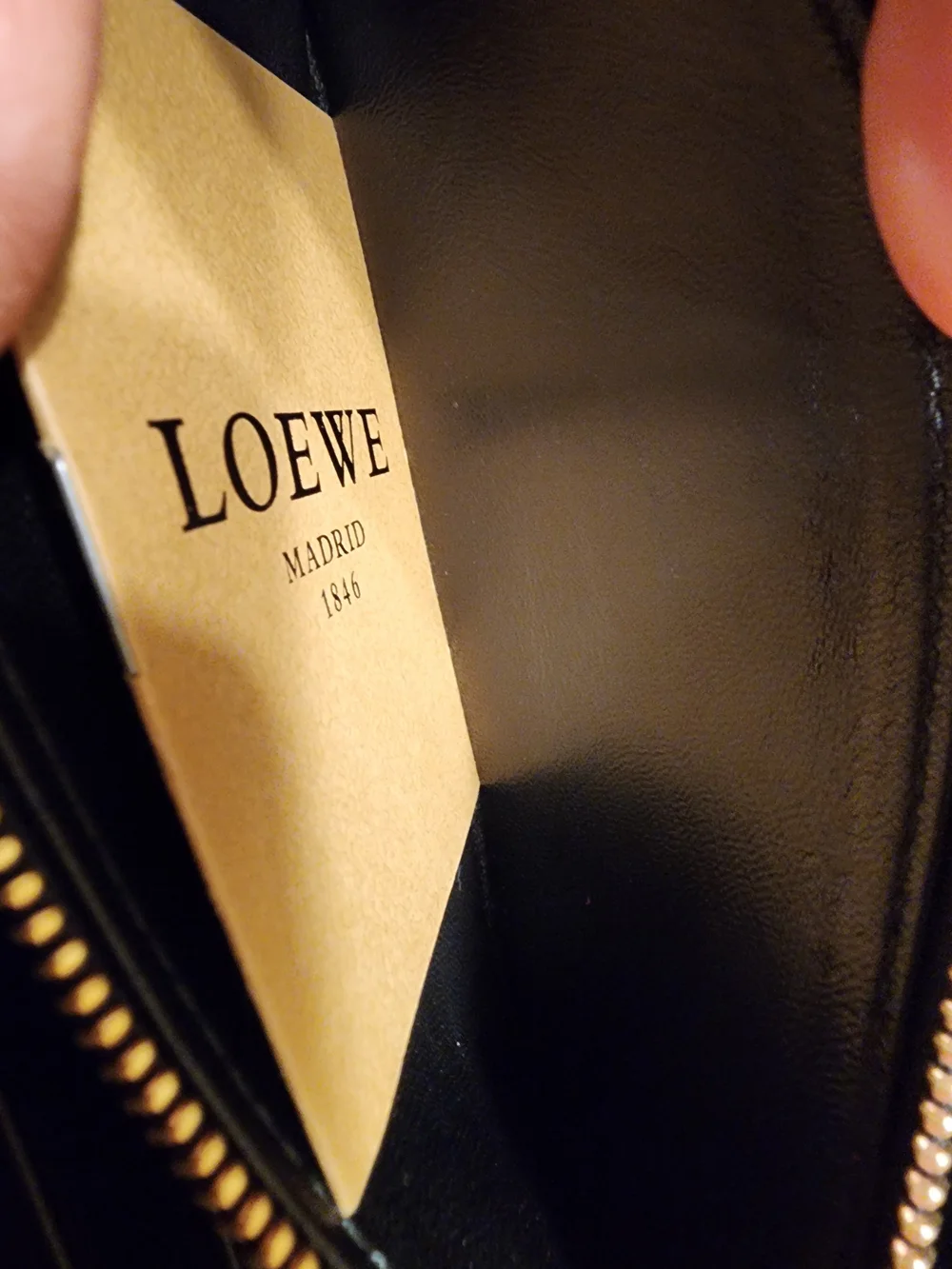 Loewe wallet features  vibrant red suede body & black crocodile Embossed Leather